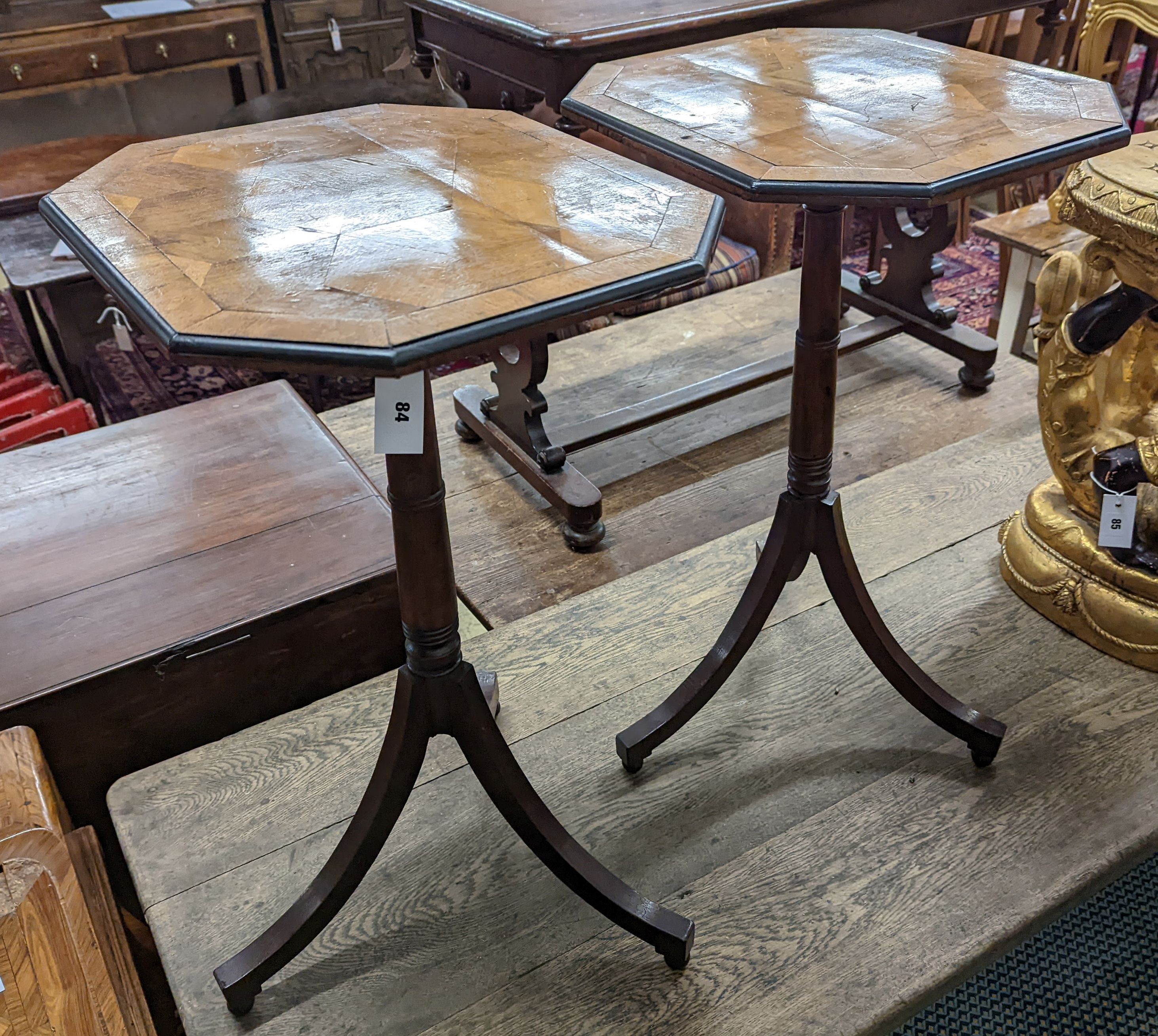 A pair of Regency style tripod tables, with walnut parquetry tops, W-38cm, D-44cm, H-71cm.